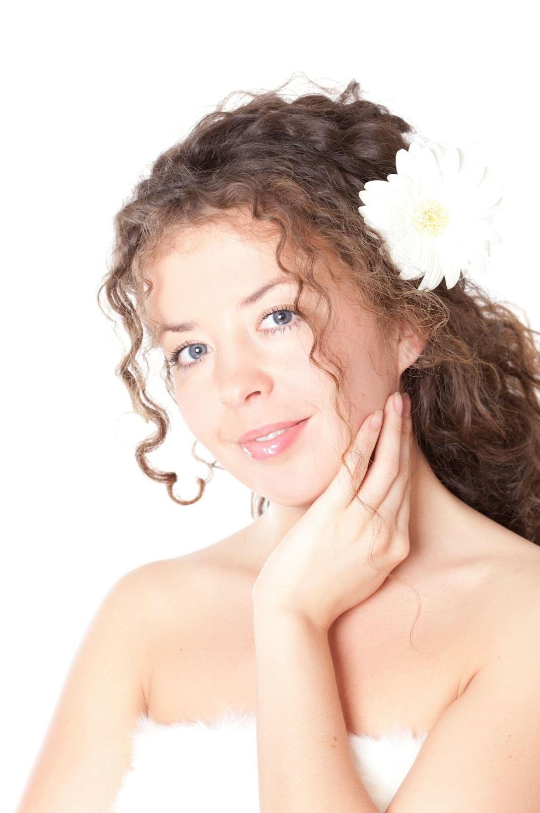 Smiling young woman with curly hair portrait