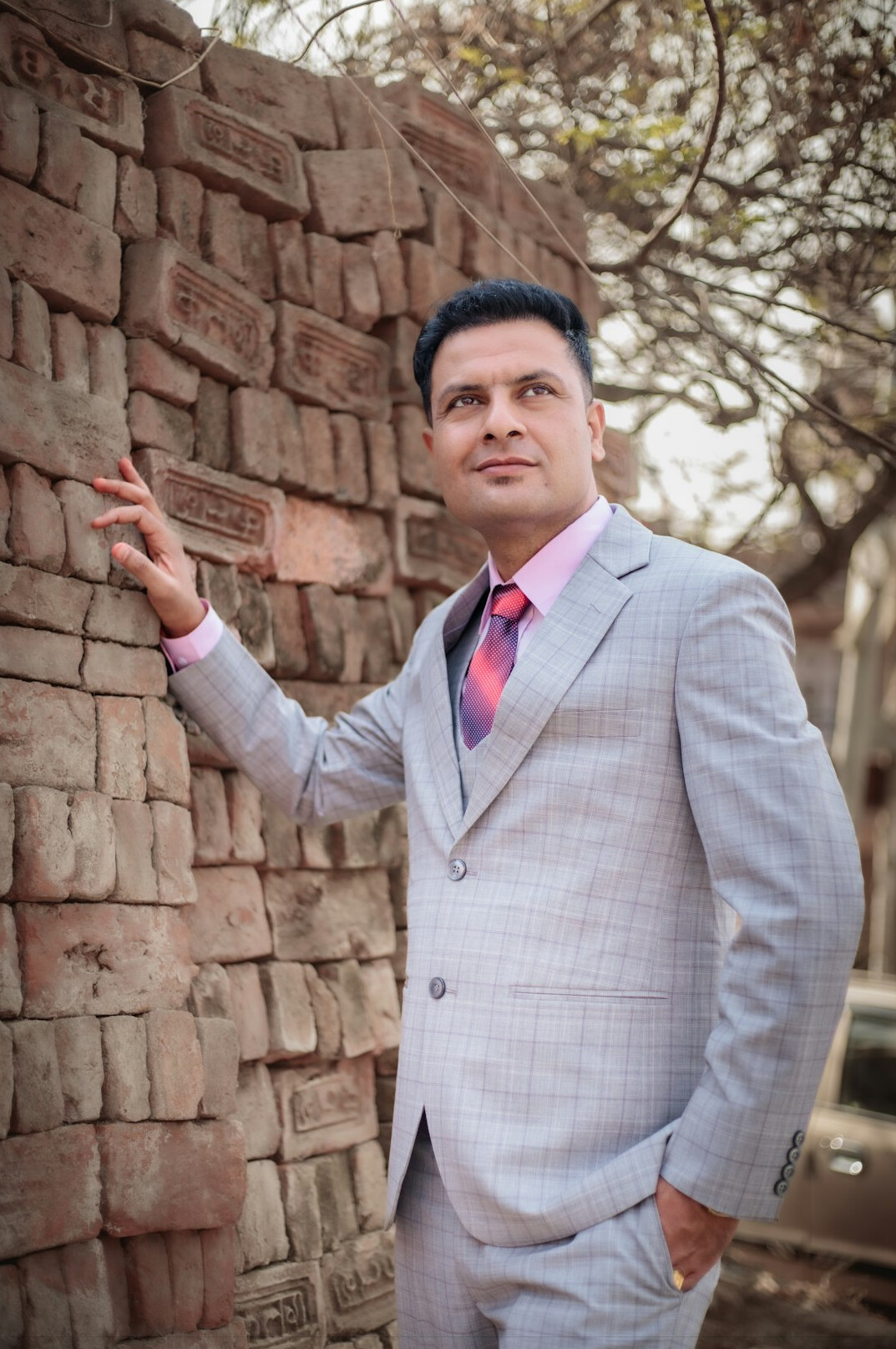 Man in suit smiling professional portrait
